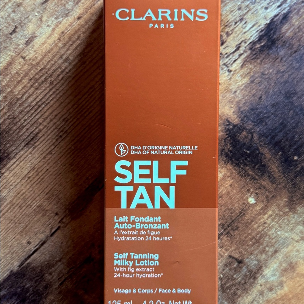 Clarins Self Tan Lotion - Orange and White